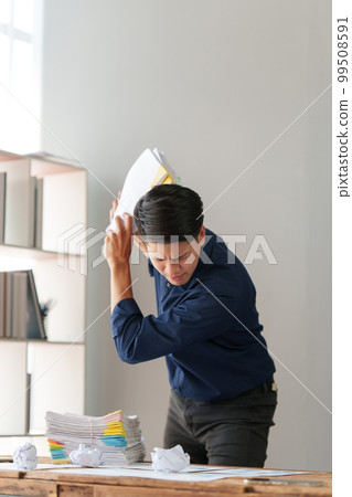 Tired business people in stress works with many paperwork document. migraine attack. Freelance, work from home. Tired business people in stress works with many paperwork document. migraine attack. Freelance, work from home. 99508591