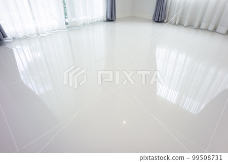 White tile floor in living room. White tile floor in living room. 99508731