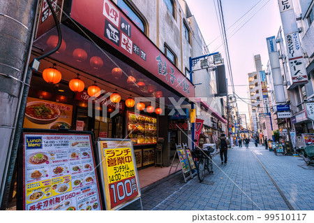 Tokyo cityscape in Japan, overlooking the west exit shopping street Tokyo cityscape in Japan, overlooking the west exit shopping street 99510117