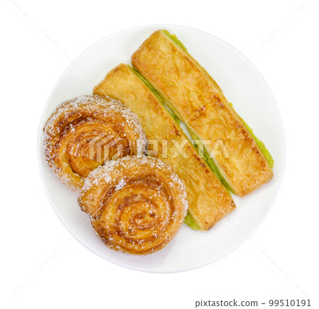 custard bread and cinnamon rolls isolated 99510191