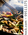 BBQ with lots of vegetables 99511375