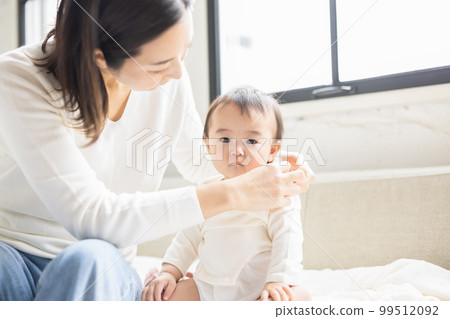 Baby and mother 99512092