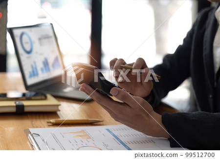 Female employee working on a laptop computer in a modern office. Make an account analysis report. real estate investment information financial and tax system concepts Female employee working on a laptop computer in a modern office. Make an account analysis report. real estate investment information financial and tax system concepts 99512700