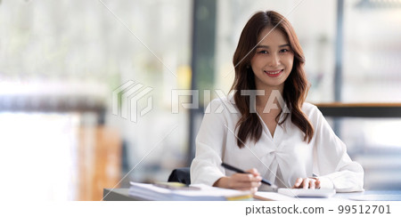 Young female work with financial papers at office count on calculator before paying taxes receipts online by phone. female employee planning budget glad to find chance for economy saving money Young female work with financial papers at office count on calculator before paying taxes receipts online by phone. female employee planning budget glad to find chance for economy saving money 99512701