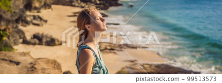 Young woman tourist on Pantai Tegal Wangi Beach, Bali Island, Indonesia. Bali Travel Concept BANNER, LONG FORMAT Young woman tourist on Pantai Tegal Wangi Beach, Bali Island, Indonesia. Bali Travel Concept BANNER, LONG FORMAT 99513573