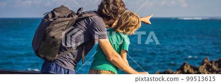 Father and son travelers on amazing Nusadua, Waterbloom Fountain, Bali Island Indonesia. Traveling with kids concept BANNER, LONG FORMAT 99513615