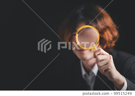 Asian businessman use magnifying glass for CRM, Customer Relationship Management. HR, human resource search personnel. Global structure customer network technology, Data exchanges development, Job. 99515249