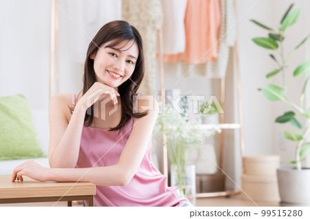 A young woman relaxing at home 99515280