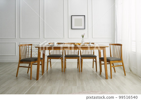 Interior with wooden dining table in white space Interior with wooden dining table in white space 99516540