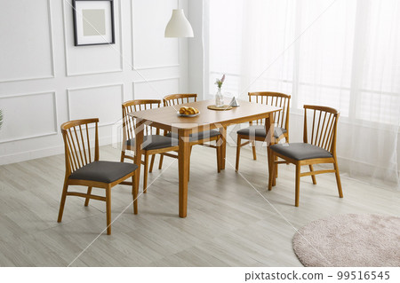 Interior with wooden dining table in white space 99516545