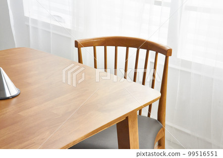 Interior with wooden dining table in white space 99516551