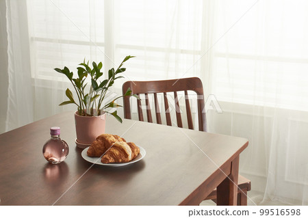 Interior with wooden dining table in white space Interior with wooden dining table in white space 99516598