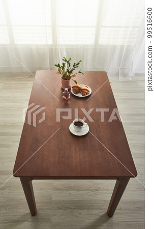 Interior with wooden dining table in white space Interior with wooden dining table in white space 99516600