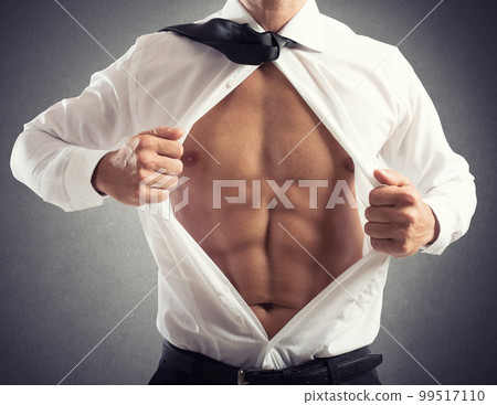 Businessman acts like a superhero. concept of bravery, determination and success 99517110