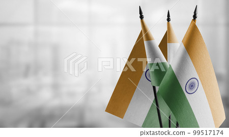 A small India flag on an abstract blurry background A small India flag on an abstract blurry background 99517174