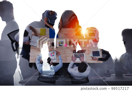 Team of businessmen work together in office. Concept of teamwork and partnership. double exposure Team of businessmen work together in office. Concept of teamwork and partnership. double exposure 99517217