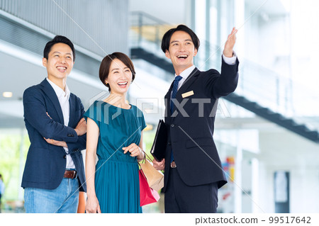 Business businessman sales couple couple middle school concierge real estate 99517642