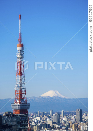The symbol tower of the big city of Tokyo, the cityscape, and the view of Mt. Fuji covered with snow | Tokyo image | Tokyo 99517995