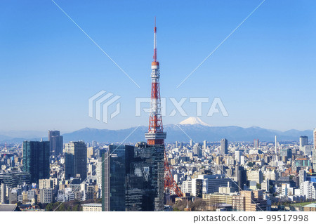The symbol tower of the big city of Tokyo, the cityscape, and the view of Mt. Fuji covered with snow | Tokyo image | Tokyo 99517998