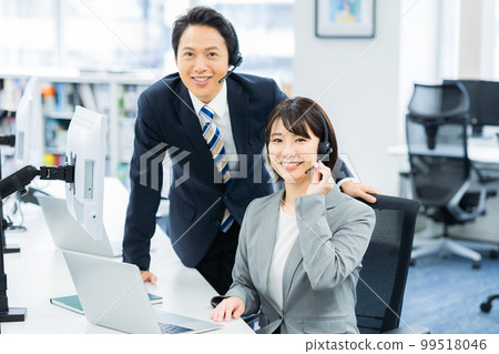Business people working in the office Business people working in the office 99518046