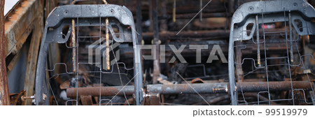 Burnt rusty car after fire or accident Burnt rusty car after fire or accident 99519979
