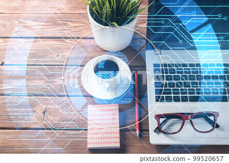 Business workplace with laptop coffee cup and security concept on screen 99520657