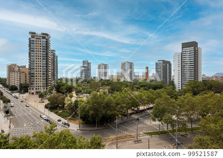 Aerial view of modern high-tech area of Barcelona - Diagonal Mar with high standard of living on the blue sky background. Concept of comfortable life in Spain near the sea Aerial view of modern high-tech area of Barcelona - Diagonal Mar with high standard of living on the blue sky background. Concept of comfortable life in Spain near the sea 99521587
