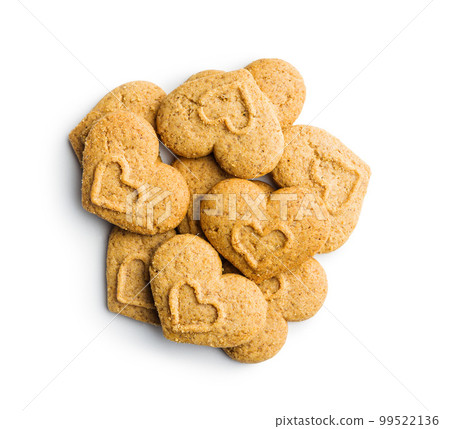 Sweet gingerbread hearts isolated on white background. 99522136