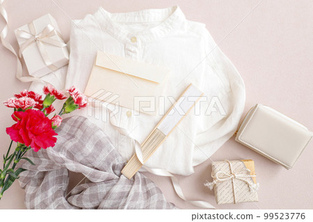 Gift selection of ladies' items Image of Mother's Day Pink background Gift selection of ladies' items Image of Mother's Day Pink background 99523776