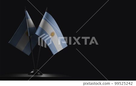 Small national flags of the Argentina on a black background 99525242
