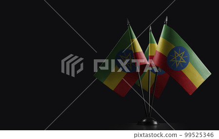 Small national flags of the Ethiopia on a black background 99525346