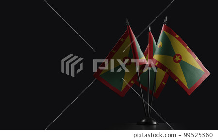 Small national flags of the Grenada on a black background Small national flags of the Grenada on a black background 99525360