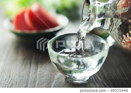 Poured sake and pickles (red turnip) Poured sake and pickles (red turnip) 99525449