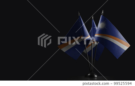 Small national flags of the Marshall on a black background 99525594