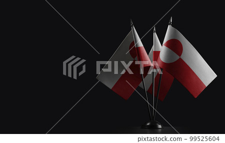 Small national flags of the Greenland on a black background Small national flags of the Greenland on a black background 99525604