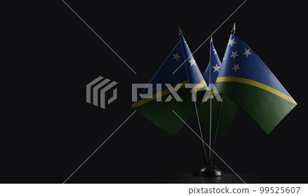 Small national flags of the Solomon on a black background Small national flags of the Solomon on a black background 99525607