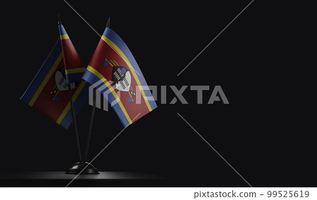 Small national flags of the Swaziland on a black background Small national flags of the Swaziland on a black background 99525619