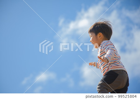Blue Sky and Child 99525804