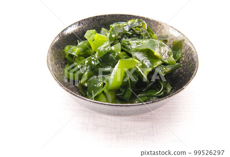 Laminaria (Kelp) Seaweed in black ceremic bowl. Japanese healthy food. 99526297