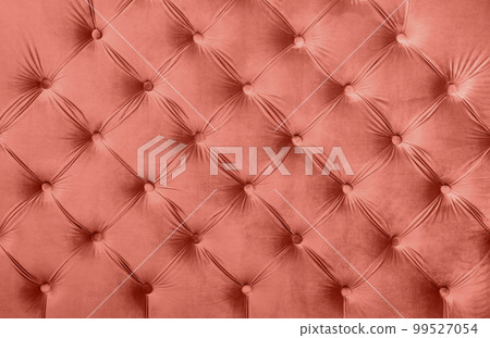 Pink capitone tufted fabric upholstery texture Pink capitone tufted fabric upholstery texture 99527054
