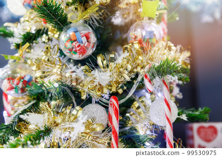 Decorated Christmas tree lights twinkling and sparkling. 99530975