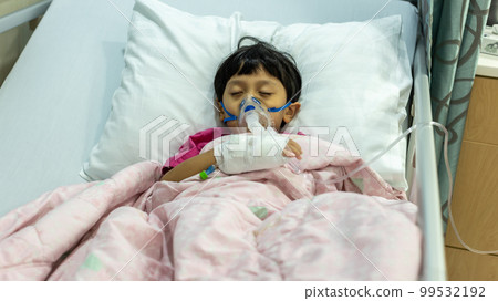 Sick boy inhalation therapy by the mask of inhaler. Sick boy inhalation therapy by the mask of inhaler. 99532192