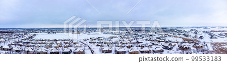 Panoramic drone aerial photo of the south side of Sioux Falls, South Dakota during the winter after a snow storm. Panoramic drone aerial photo of the south side of Sioux Falls, South Dakota during the winter after a snow storm. 99533183