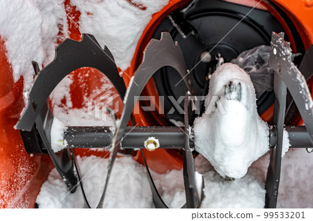 Selective focus on breakaway shear pin on a snowblower auger  99533201