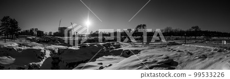 Sioux Falls Park during winter with frozen waterfall and snow cover. Sioux Falls Park during winter with frozen waterfall and snow cover. 99533226