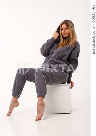 Sporty blonde girl in thermal clothing for women Sporty blonde girl in thermal clothing for women 99533465