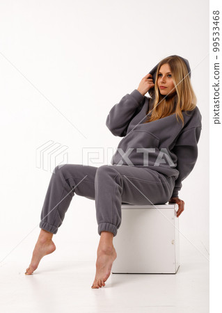Sporty blonde girl in thermal clothing for women Sporty blonde girl in thermal clothing for women 99533468