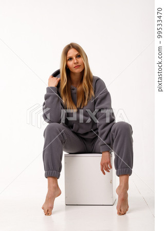 Sporty blonde girl in thermal clothing for women Sporty blonde girl in thermal clothing for women 99533470