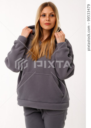 Sporty blonde girl in thermal clothing for women 99533479
