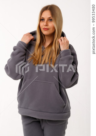 Sporty blonde girl in thermal clothing for women Sporty blonde girl in thermal clothing for women 99533480